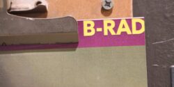 Photo of portion of poster attached to a clipboard. B-RAD can be seen in the corner of the poster. B-Rad is the college radio station at Bennington College. Photo by J. Waits