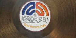 Photo of KRCX logo on a gold record at the Regis University college radio station. Photo: J. Waits